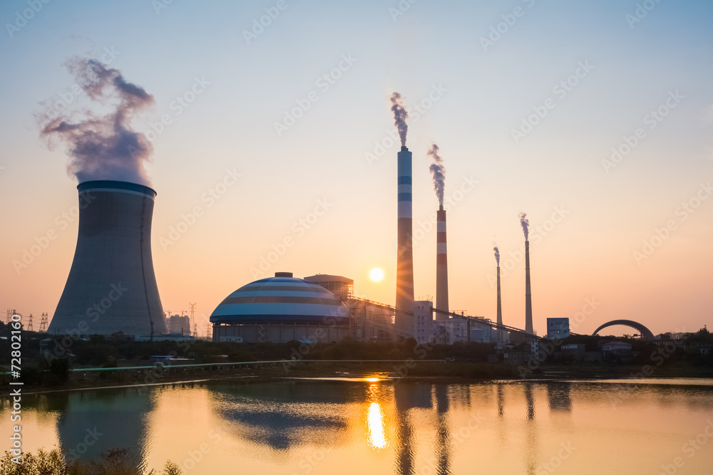 Poster coal power station with the setting sun