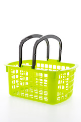 Shopping plastic basket isolated on white background