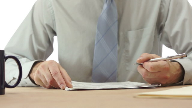Office Worker Checks Off Paper List
