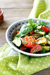 salad with tomato, cucumber and pesto
