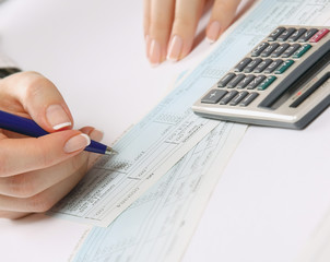 Business woman working with tax documents