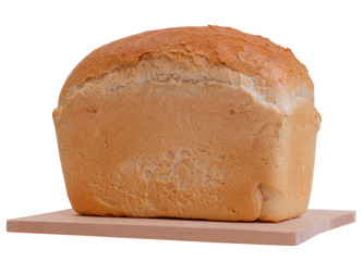 loaf of bread on cutting board isolated on white background