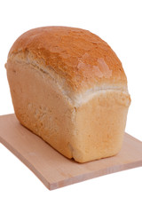 loaf of bread on cutting board isolated on white background