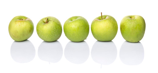 A group of green apples over white background