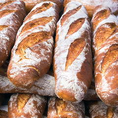 French breads in a bakery market - 72816368