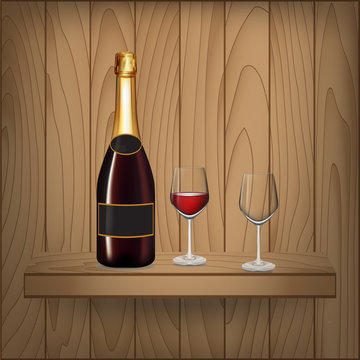Wine bottle and glass on wood shelf