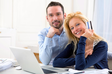 Young attractive couple shopping online