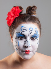 Woman with circus makeup.