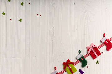 Fototapeta na wymiar Christmas decoration on a background of white painted rustic boa