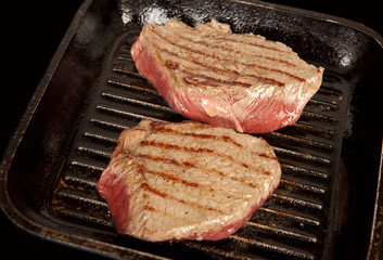 Beef roasts in the pan