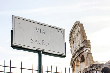 Via sacra street sign on stand in Rome Italy
