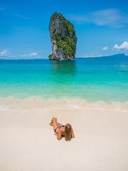 Fototapeta na wymiar Beautiful woman on the beach. Poda island. Thailand
