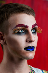 Handsome young man fashion model with make-up