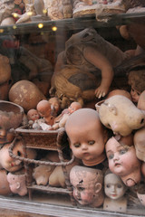 Dolls heads in a window in rome