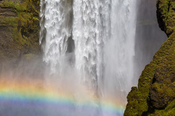 Skogafoss, close up of the waterfall and rainbow