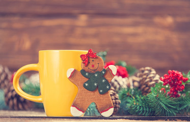 Toy gingerbread and cup of coffee