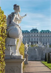 Zelfklevend Fotobehang Vienna - Statue in gardens of Belvedere palace in evening © Renáta Sedmáková