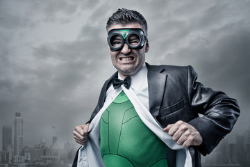 Superhero taking off shirt and jacket