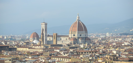 Fototapeta na wymiar Cityscape of Florence, Italy, with the Cathedral and bell tower