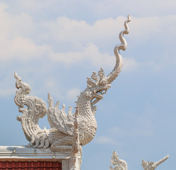 Fototapeta na wymiar Art on the roof at Thai temple, Thailand