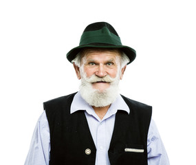 Old bavarian man in hat isolated