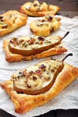 Pears baked in puff pastry with gorgonzola cheese and walnuts