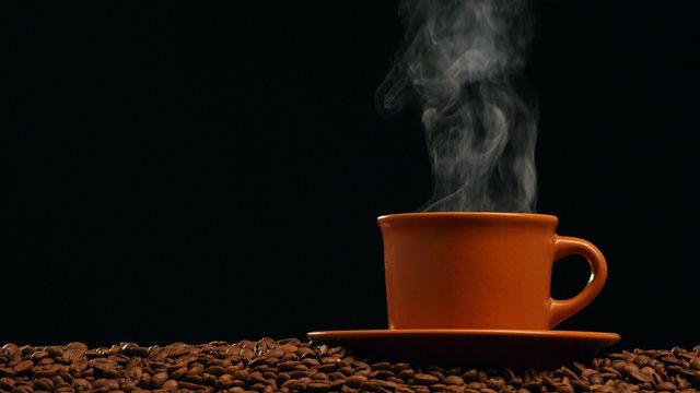  Cup of coffee on dark background