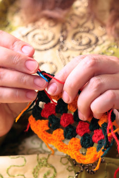 Close-up of hands knitting