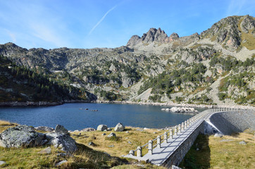 Artificial lake with a dam in the Haut-Pyrenees