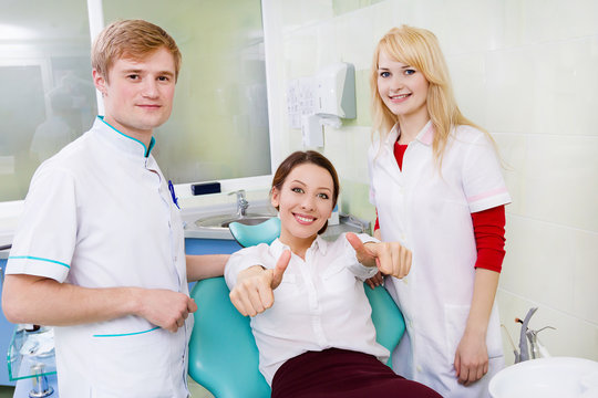 happy healthcare professional dentist satisfied patient 