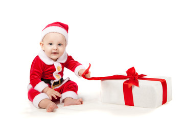 small child dressed as Santa Claus