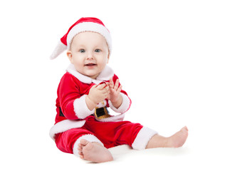 small child dressed as Santa Claus