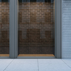 Empty storefront with brickwall