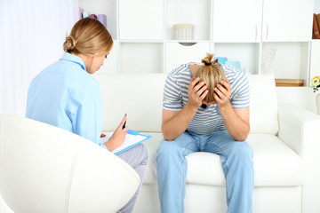 Young man on reception at psychologist