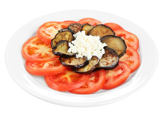 Eggplant salad with tomatoes and feta cheese, isolated on white