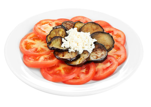 Eggplant salad with tomatoes and feta cheese, isolated on white