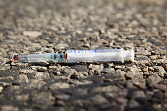 Syringe  thrown out on road
