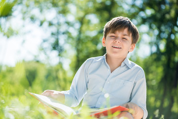 Boy in summer park