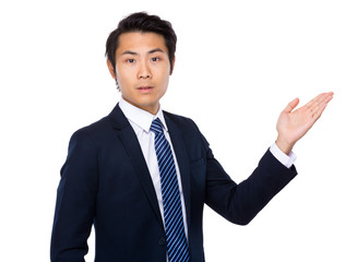 Businessman with open hand palm
