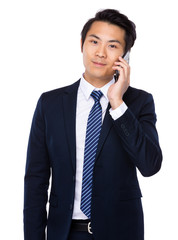 Businessman talk to mobile phone