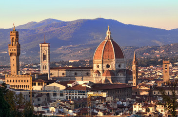 Fototapeta na wymiar Sunset over Palazzo Vecchio and Duomo, Florence, Italy