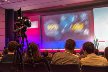 people sitting rear at the business conference