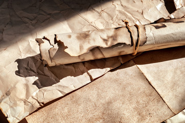 The old scroll yellow charred paper tied with a thread