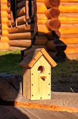 Wooden house for birds knocked together from boards