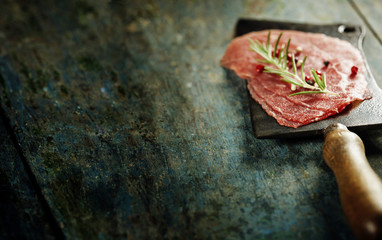 vintage cleaver and Beef Carpaccio