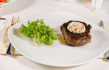 Steak with Herbed Butter and Garnish