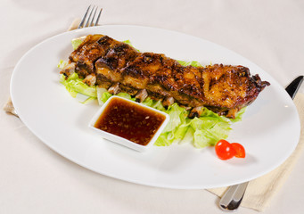 Rack of Grilled Pork Ribs on Plate