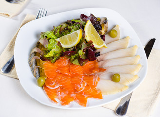 Smoked salmon served with cheese slices