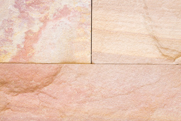 Patterned sandstone texture background.