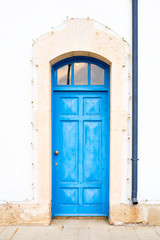 Fototapeta na wymiar Old Mediterranean Blue Door in Cyprus, Larnaca